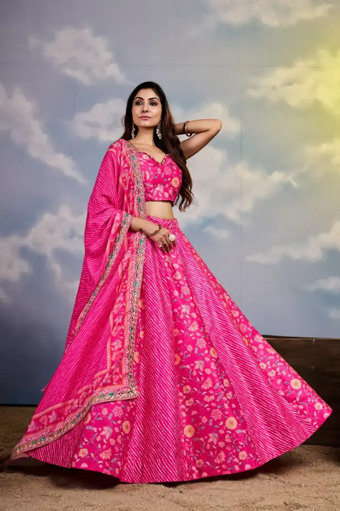 Pink kali printed Swiss satin fabric lehnga-choli with fancy lace embellishment on dupatta