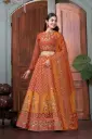 Orange color lehnga-choli with kali and flare print and fancy printed neck with piping Dori embellishment on blouse neck and waist